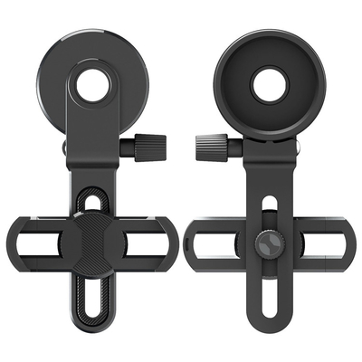Telefone celular preto que mancha o adaptador do espaço para o monocular dos binóculos do telescópio